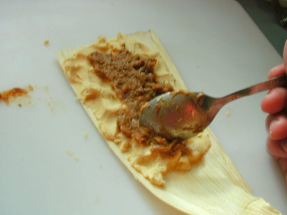 Rolling the tamale
