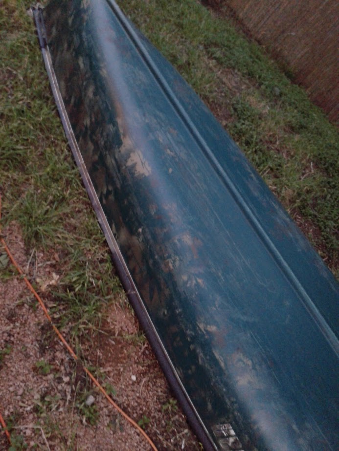 canoe with blotchy paint