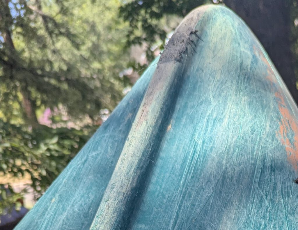patch of a pinhole leak on a plastic canoe